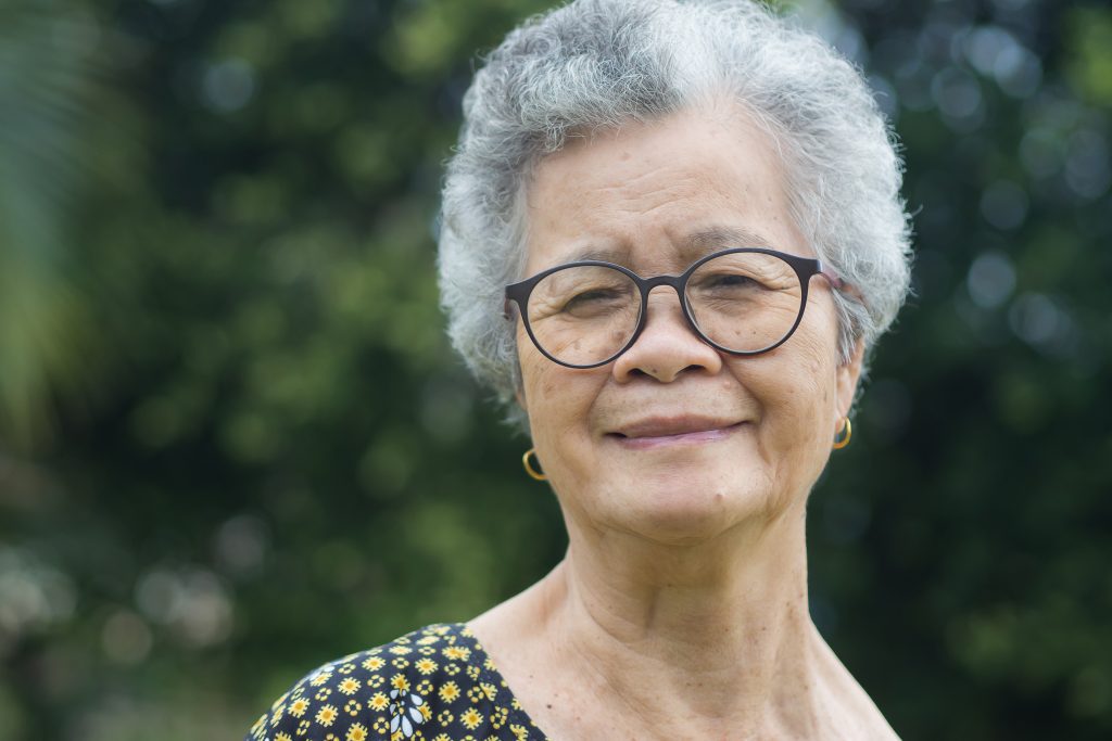Older Asian lady with glasses